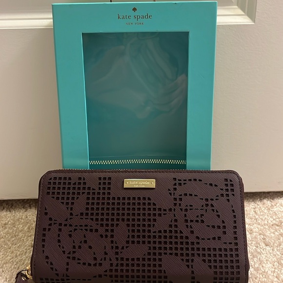 kate spade Handbags - Brand new Kate Spade Zip Wristlet - Maroon